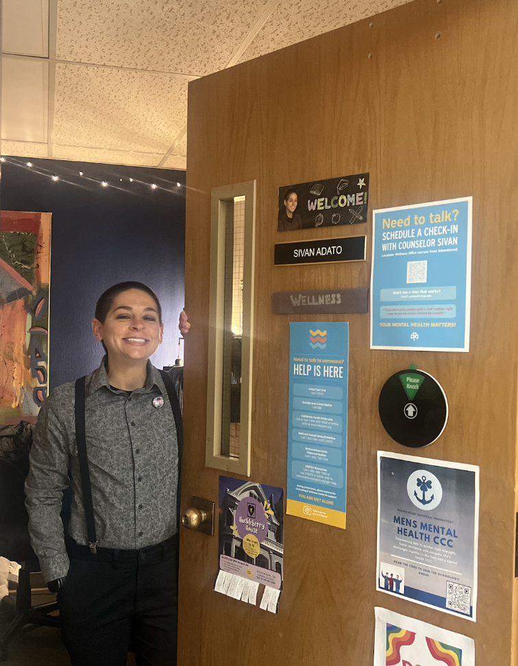 Counselor Sivan welcomes all at their door on the 3rd floor.